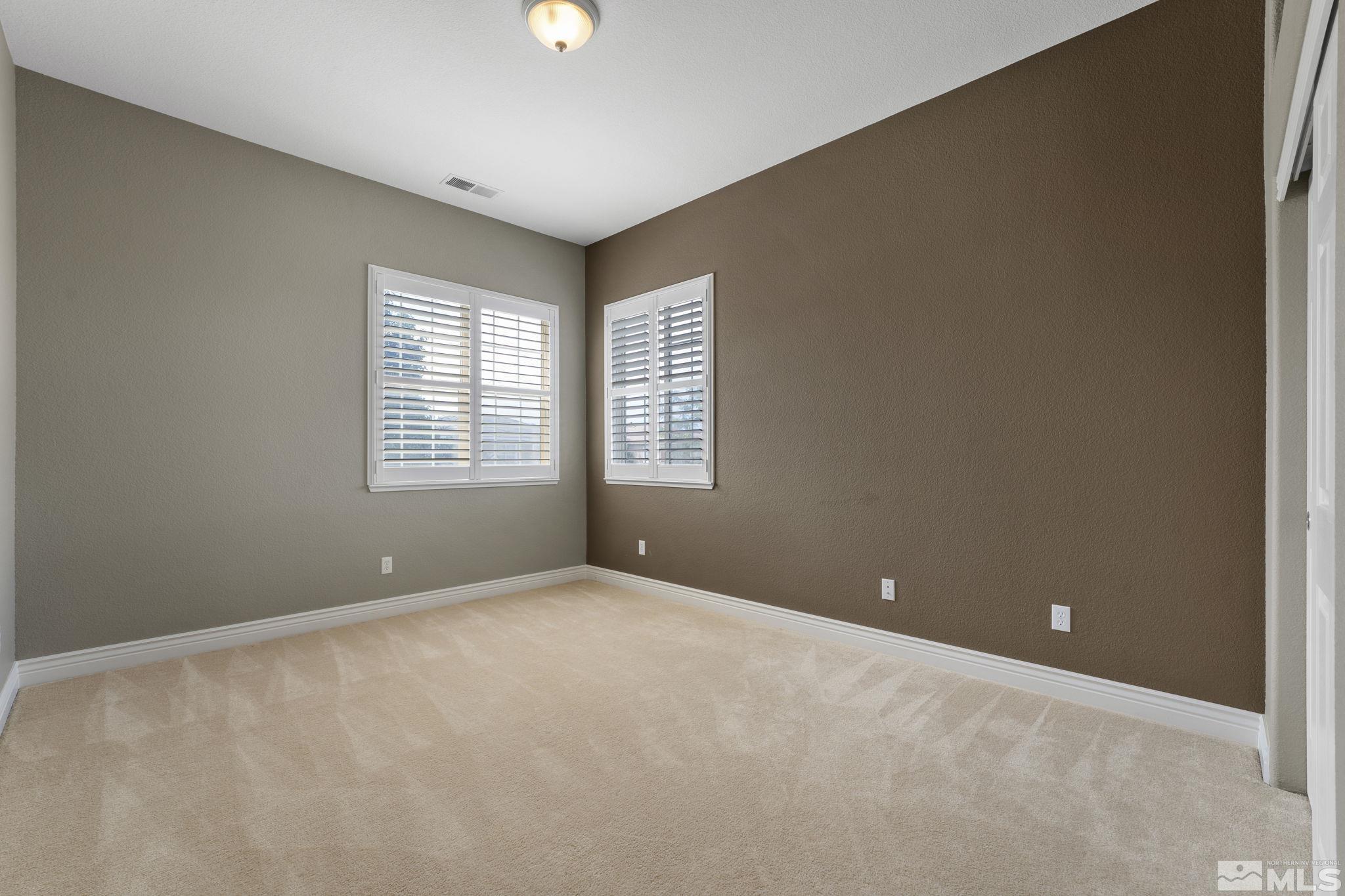 10080 Goler Wash Court Reno, NV 89521 - Photo 22 of 40 a view of an empty room with a window
