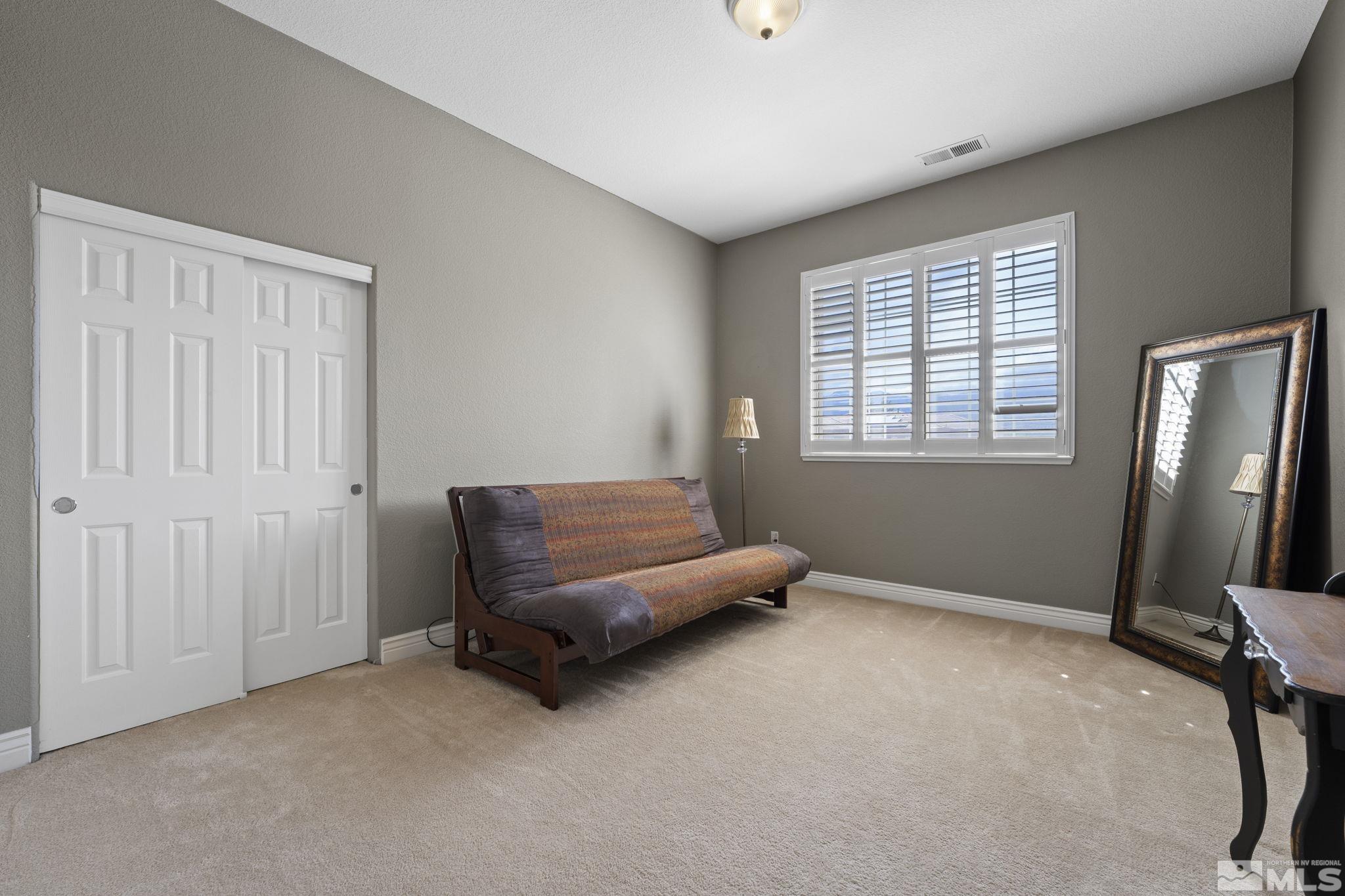10080 Goler Wash Court Reno, NV 89521 - Photo 26 of 40 a living room with furniture and a window