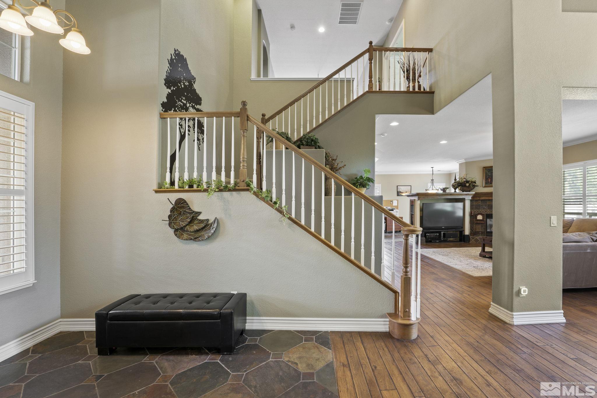 10080 Goler Wash Court Reno, NV 89521 - Photo 6 of 40 a view of entryway and hall with wooden floor