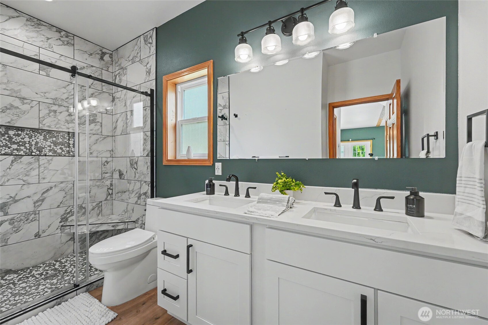 93 Golf Course Drive Pateros, WA 98846 - Photo 13 of 34 a bathroom with a double vanity sink toilet and shower