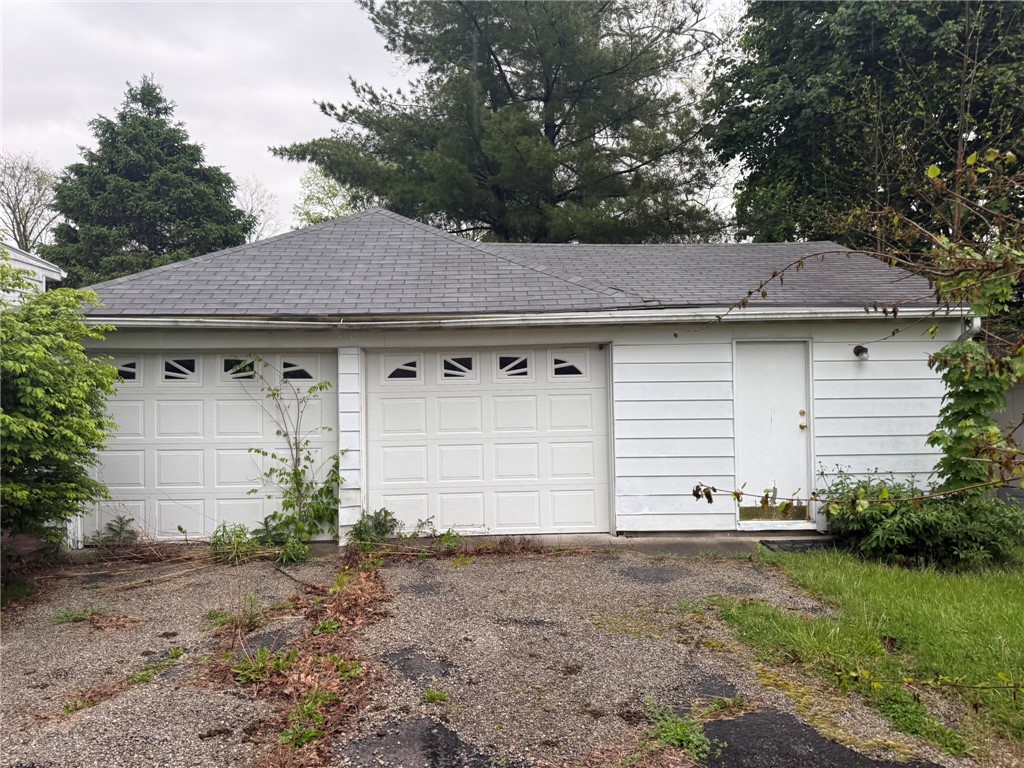 121 State Route, Unit 10570 New Paris, OH 45347 - Photo 3 of 8 This functional two-car garage features a durable shingle roof and convenient side entry.