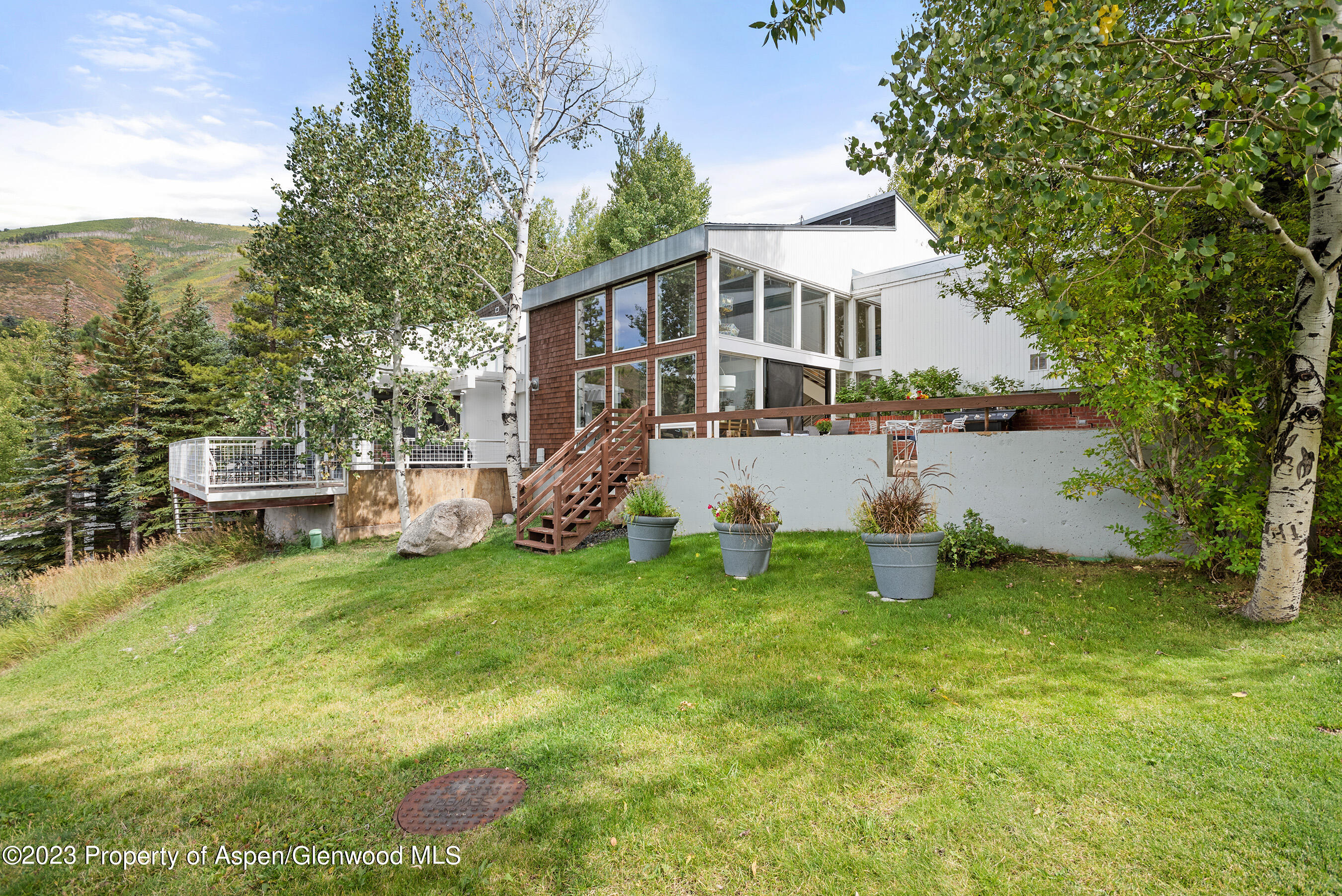 81 Meadows Trustee Road Aspen, CO 81611 - Photo 14 of 26 a house view with a garden space