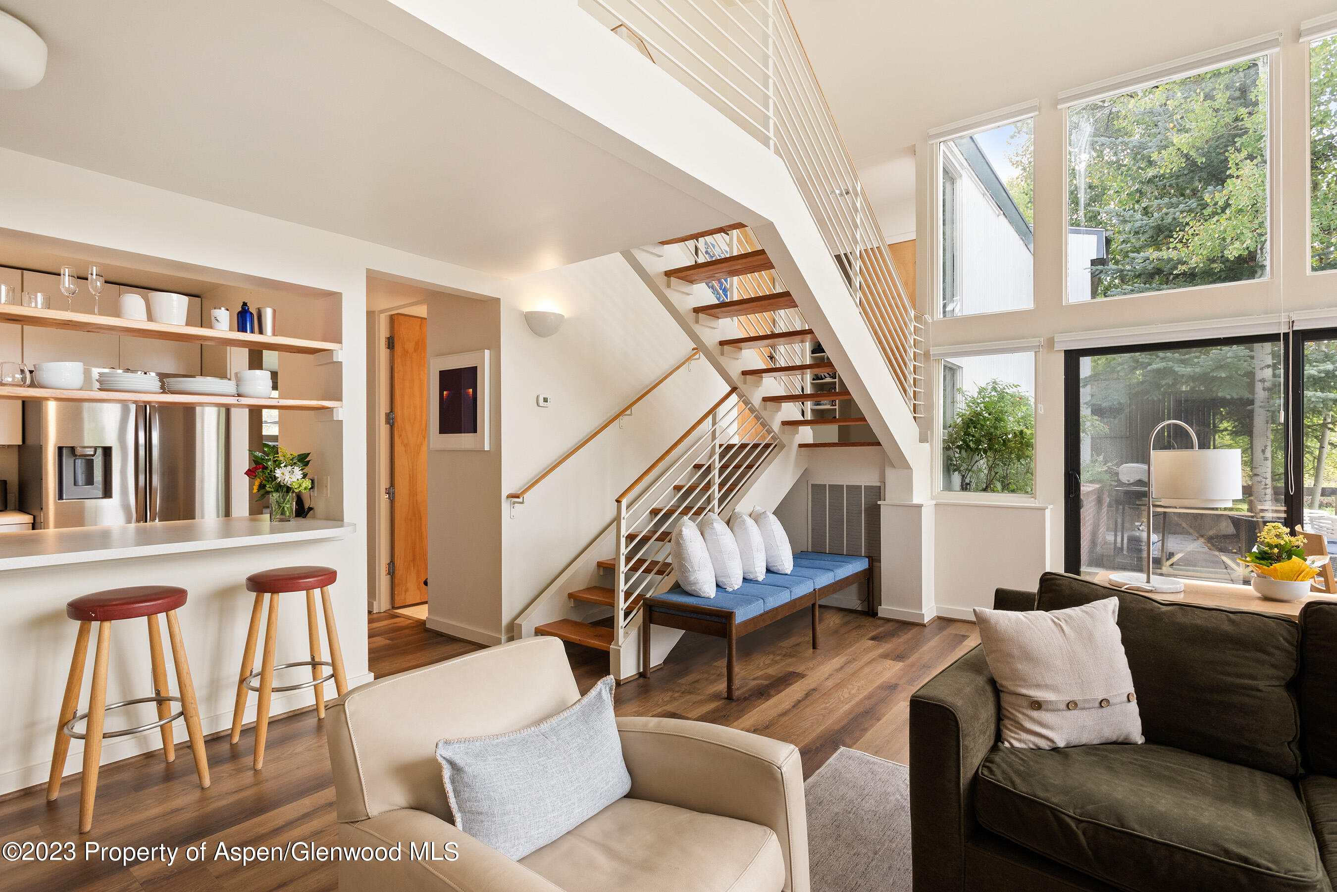 81 Meadows Trustee Road Aspen, CO 81611 - Photo 2 of 26 a living room with furniture and a large window