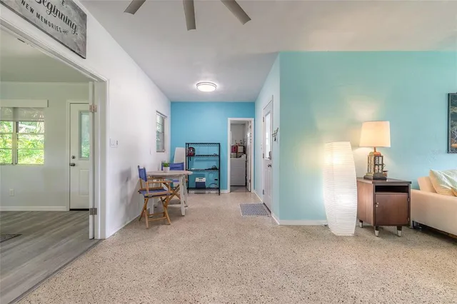 a view of a livingroom with furniture and a livingroom