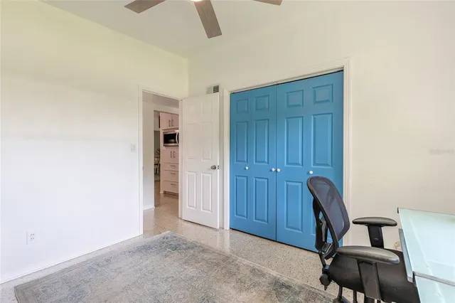 a view of room with furniture and wooden floor