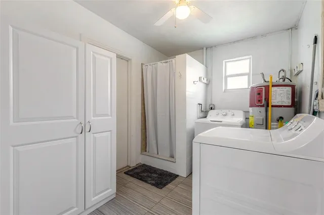 a room with a bed and a mirror