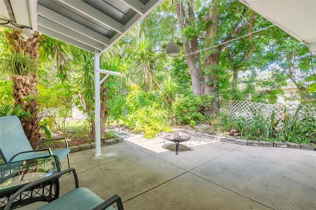 a garden view with a seating space