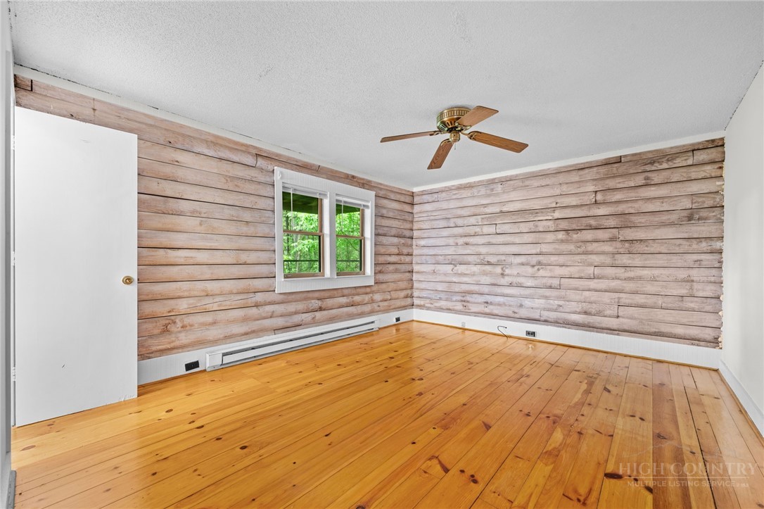 233 Alpine Acres Road Vilas, NC 28692 - Photo 11 of 32 a view of empty room with a window
