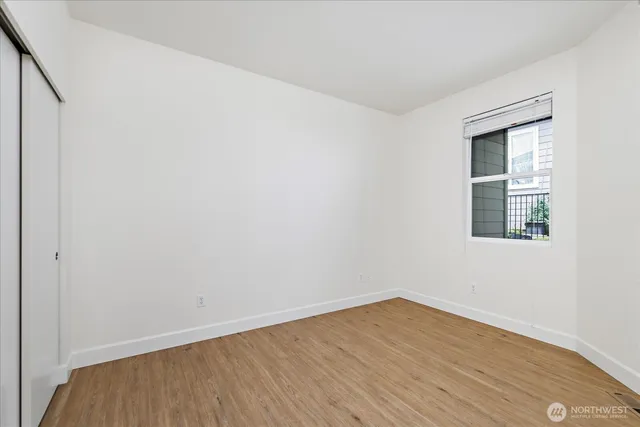 a bathroom with a sink toilet and a mirror