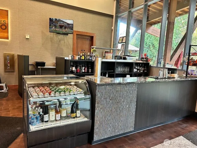 a childrens park with lots of swings and slides