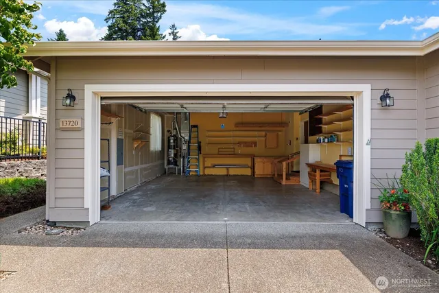 a view of a garage door and an entryway