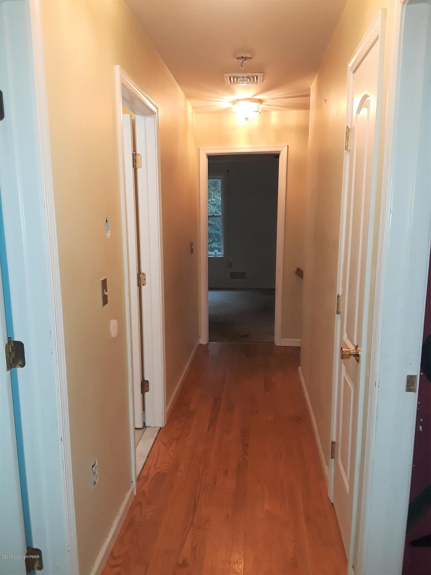 3105 Sequoia Road Tobyhanna, PA 18466 - Photo 19 of 29 a view of a bathroom from a hallway