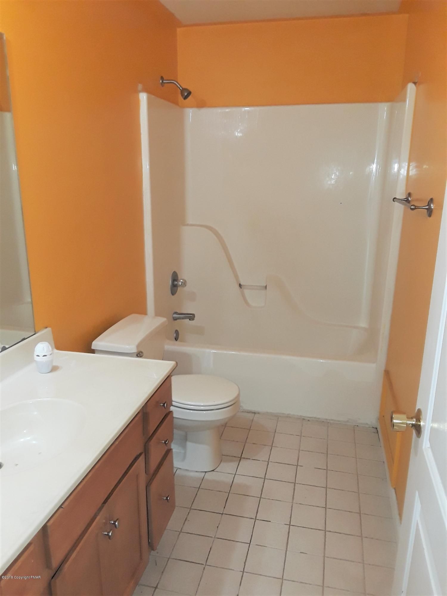 3105 Sequoia Road Tobyhanna, PA 18466 - Photo 22 of 29 a bathroom with a sink a toilet and shower