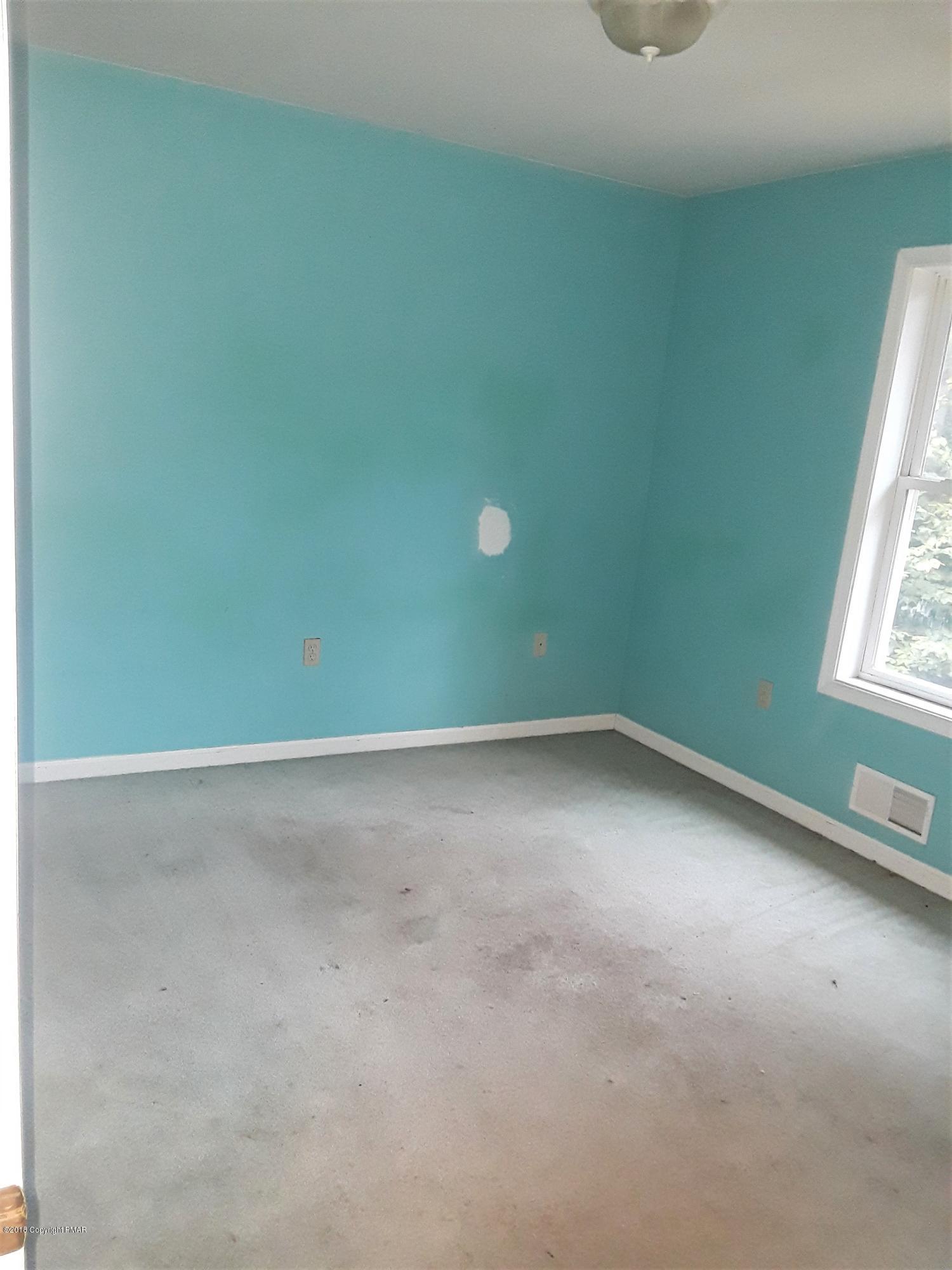 3105 Sequoia Road Tobyhanna, PA 18466 - Photo 23 of 29 an empty room with windows