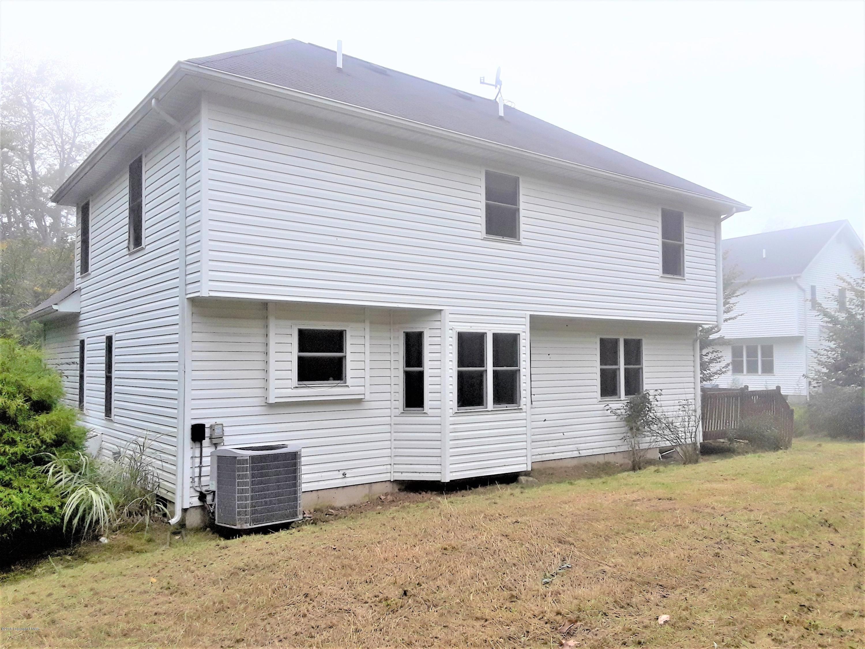 3105 Sequoia Road Tobyhanna, PA 18466 - Photo 29 of 29 a view of a house with a yard