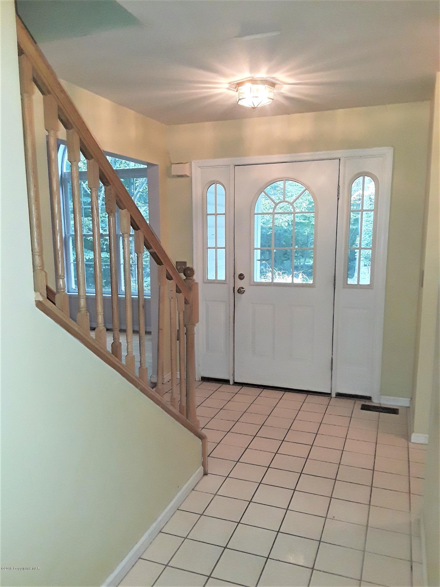 3105 Sequoia Road Tobyhanna, PA 18466 - Photo 5 of 29 a view of a hallway with windows