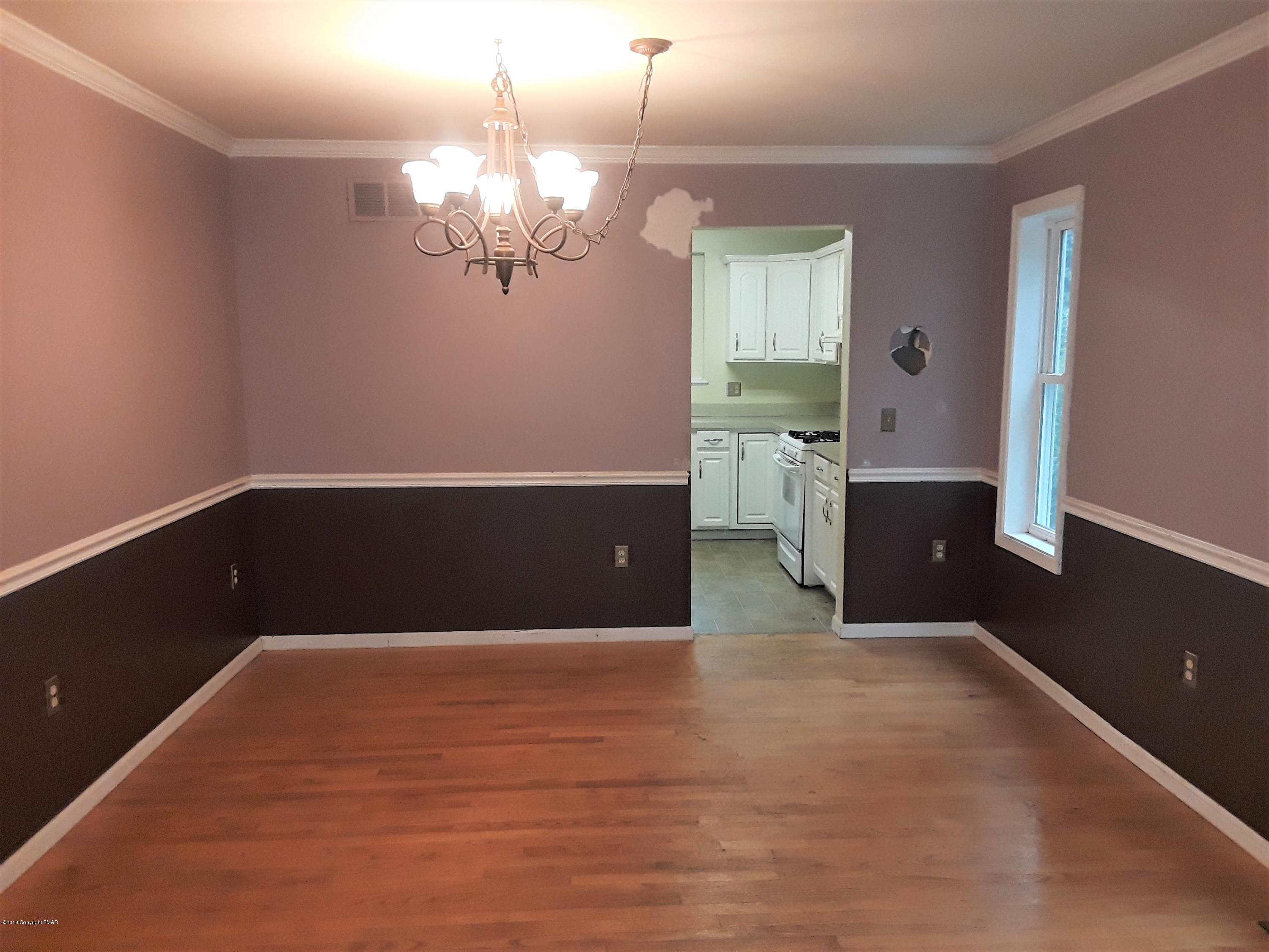 3105 Sequoia Road Tobyhanna, PA 18466 - Photo 9 of 29 a view of kitchen with window and chandelier
