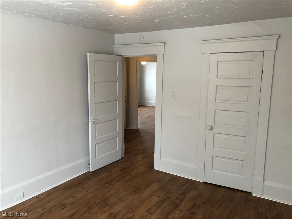 4016 Riverside Avenue Cleveland, OH 44109 - Photo 10 of 25 Spare room featuring dark hardwood / wood-style floors