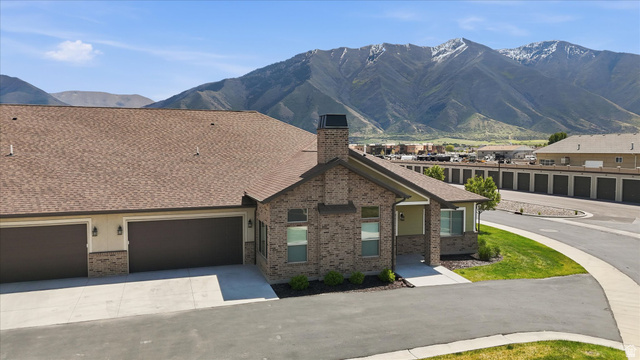 1838 West 300th Street South, Unit B Mapleton, UT 84664 - Photo 40 of 51 Brick exterior with two-car garage