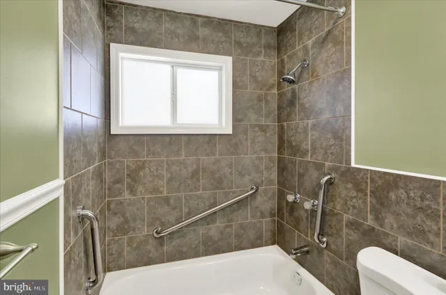 a bathroom with a sink and bathtub