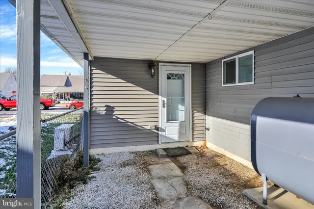 a view of a porch with furniture