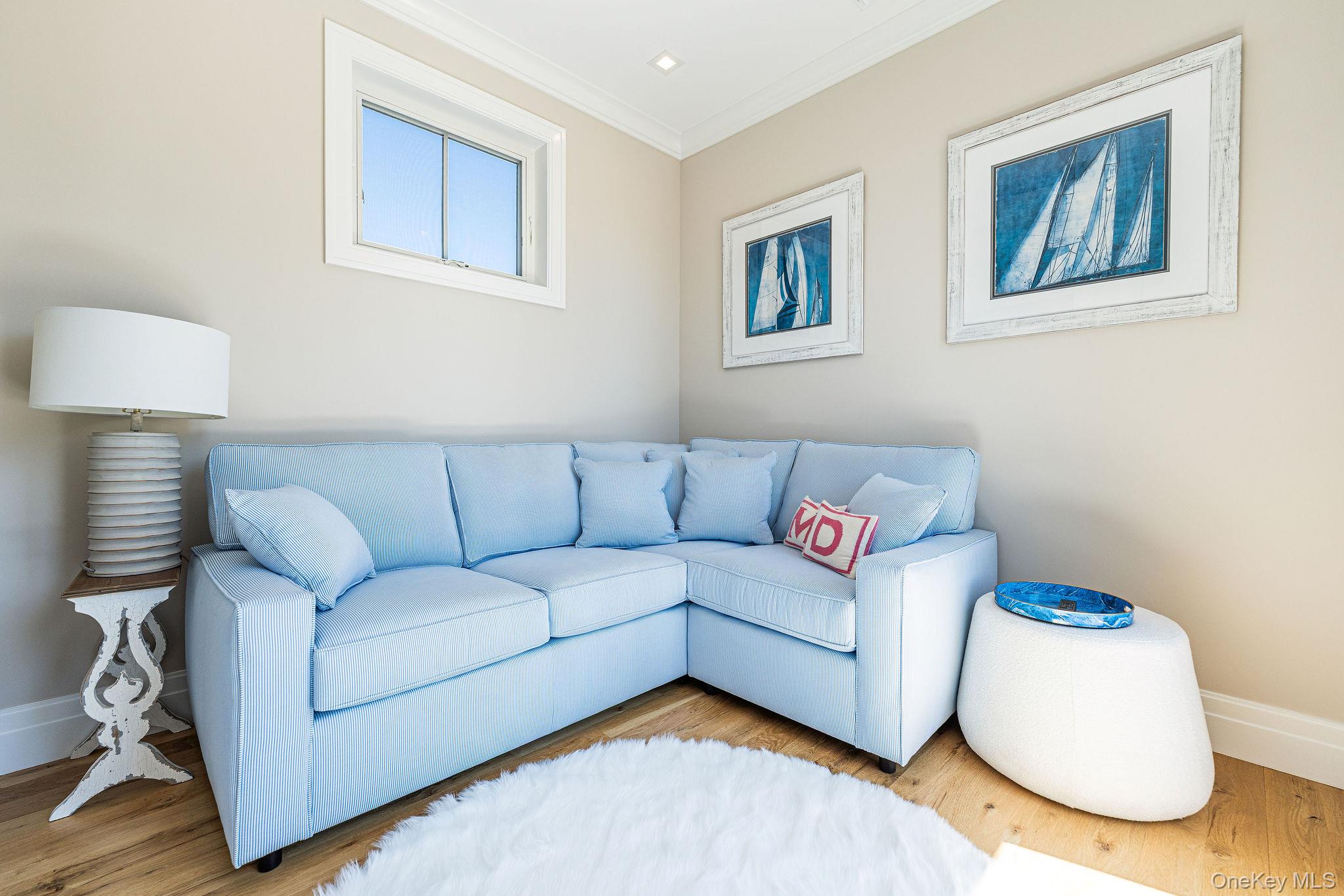 1665 Glenn Road Southold, NY 11971 - Photo 34 of 46 a living room with furniture and a couch