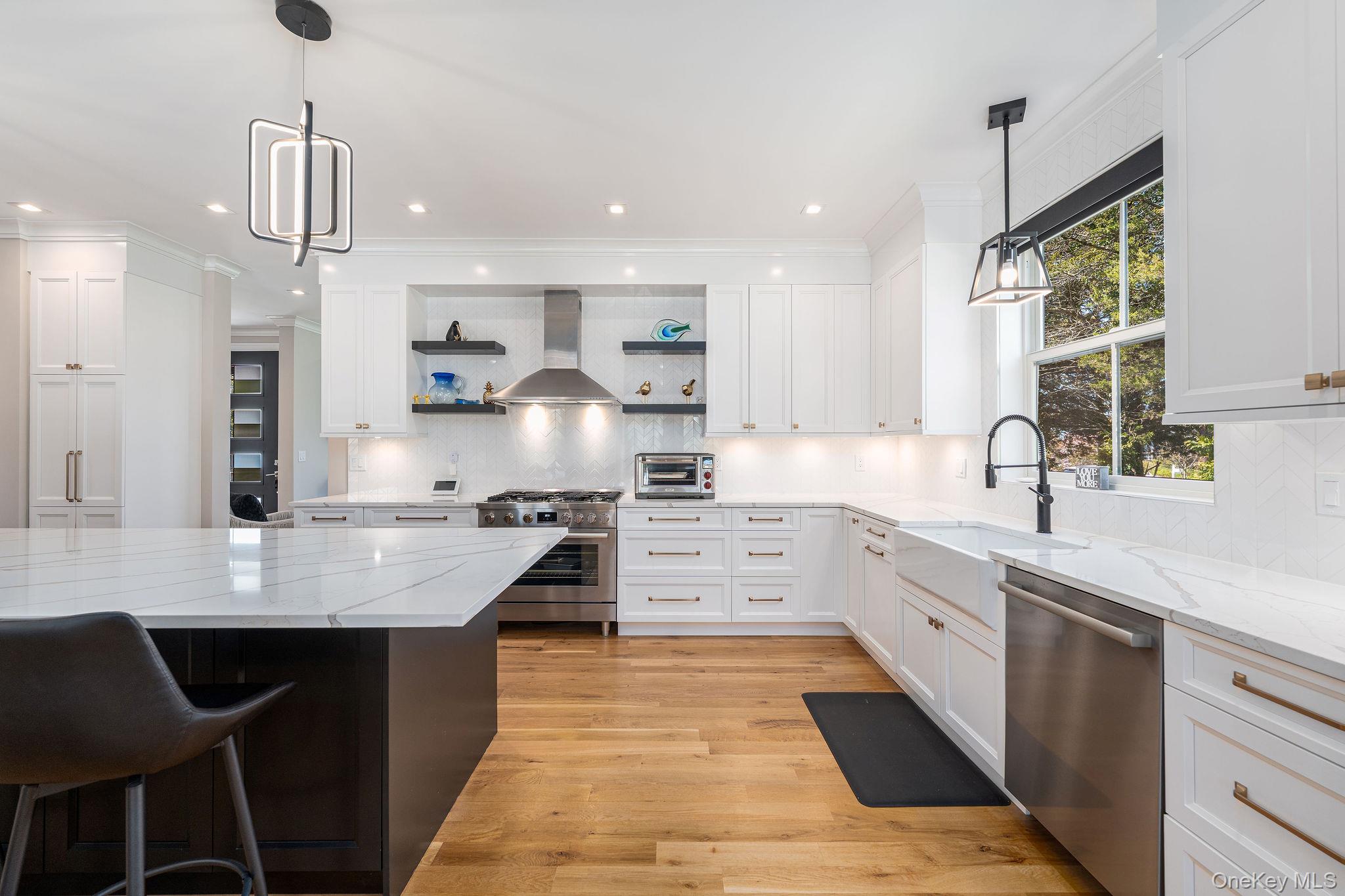 1665 Glenn Road Southold, NY 11971 - Photo 6 of 46 a large kitchen with granite countertop lots of counter top space and appliances