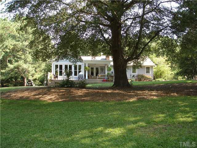 11703 Durant Road Raleigh, NC 27615 - Photo 1 of 18 Lovely home in North Raleigh on approximately 4 acres with a pond! Exterior Front