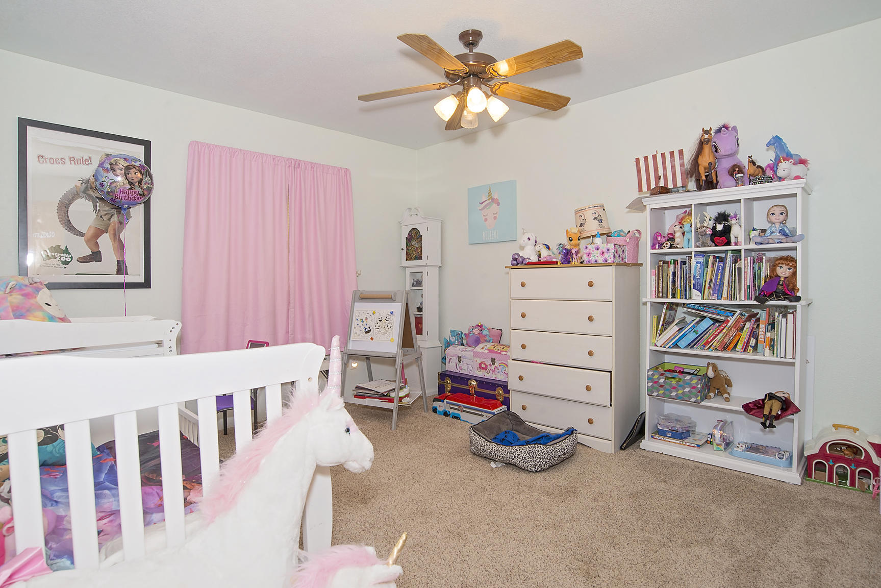11754 Dixie Road White City, OR 97503 - Photo 20 of 38 a children room with toys and a book shelf