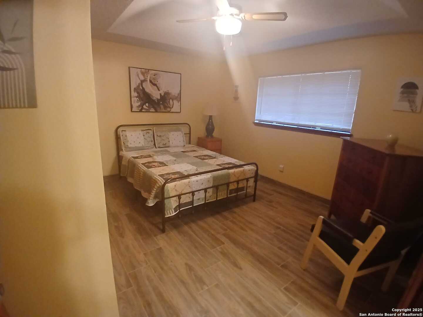 1816 Polk Street Mission, TX 78572 - Photo 12 of 21 a bedroom with a bed and a desk