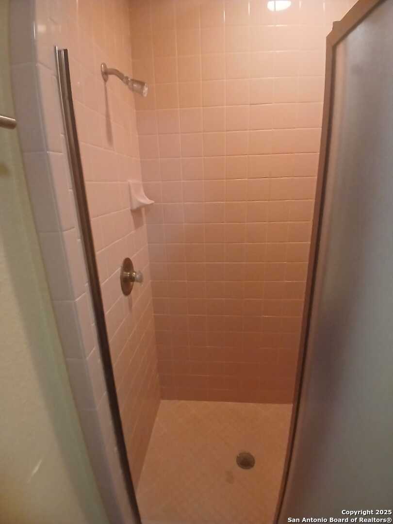 1816 Polk Street Mission, TX 78572 - Photo 15 of 21 a bathroom with a shower