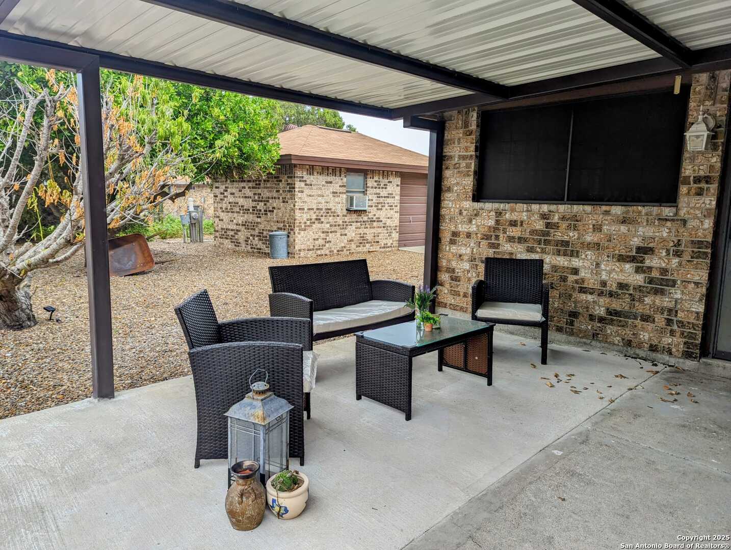 1816 Polk Street Mission, TX 78572 - Photo 19 of 21 a living room with fireplace furniture and a flat screen tv