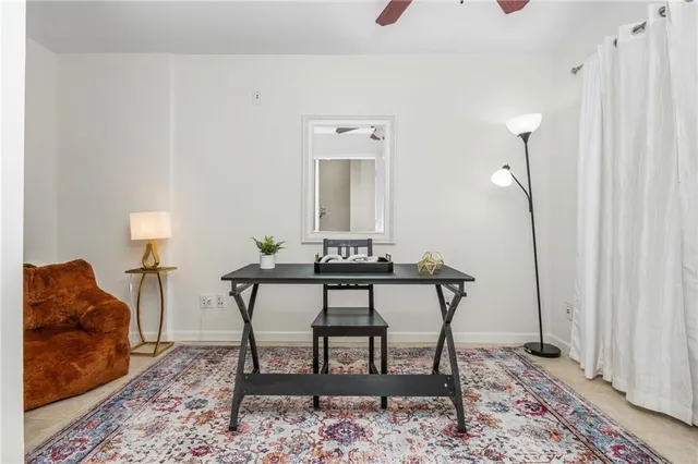 a workspace with furniture and wooden floor