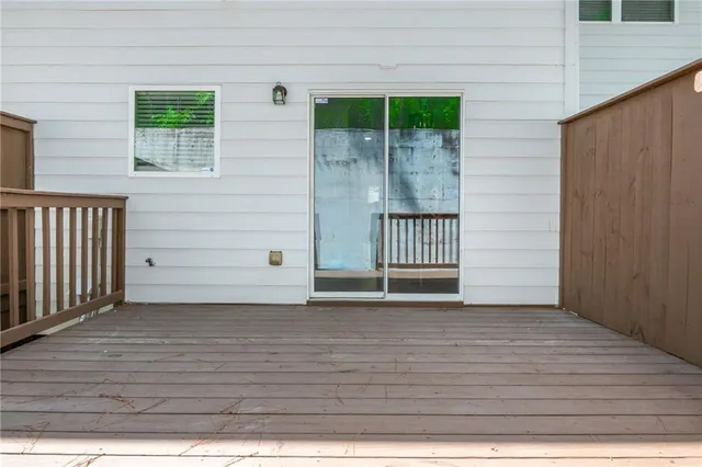 a view of front door and deck