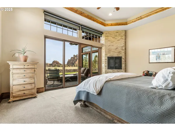 a spacious bedroom with a bed and a couch