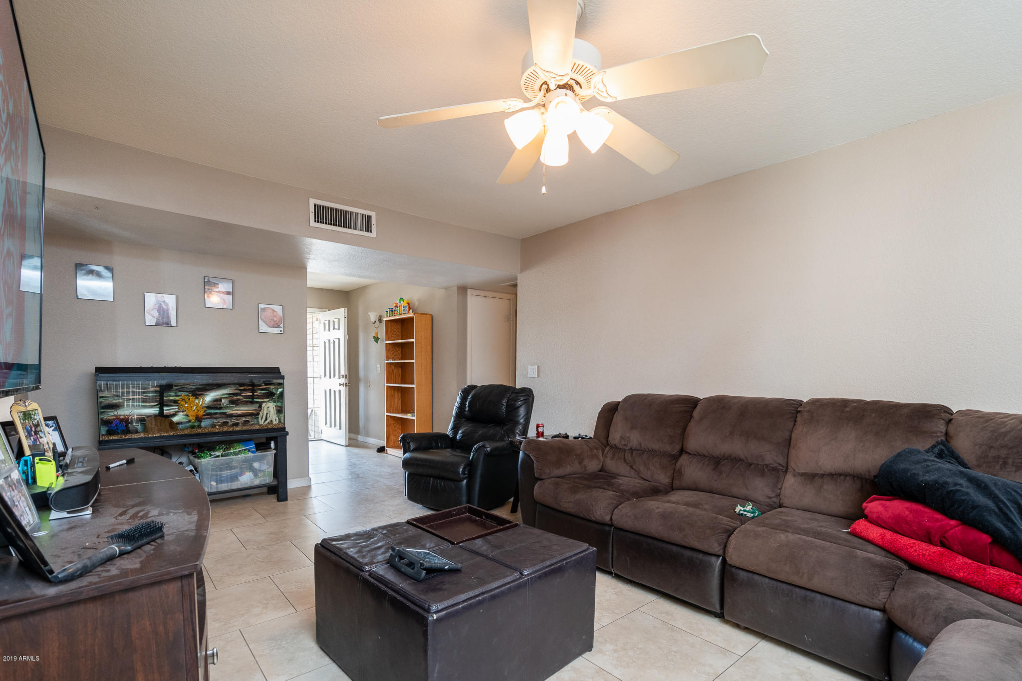 4447 West Bloomfield Road Glendale, AZ 85304 - Photo 6 of 38 06_Living-Room-02