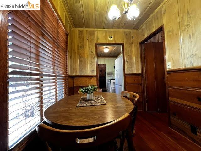 39 Cow Creek Road Pinecrest, CA 95364 - Photo 14 of 44 a view of a dining room with furniture and wooden floor
