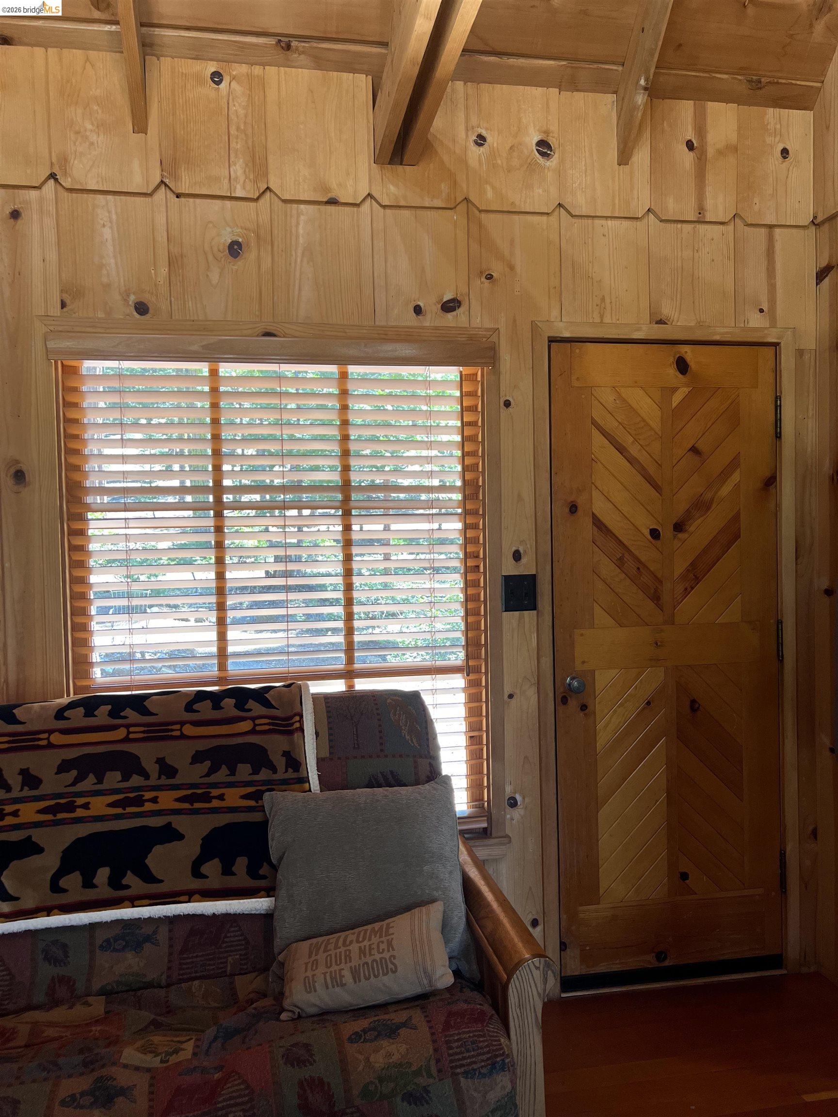 39 Cow Creek Road Pinecrest, CA 95364 - Photo 25 of 44 a bathroom with a tub and a window