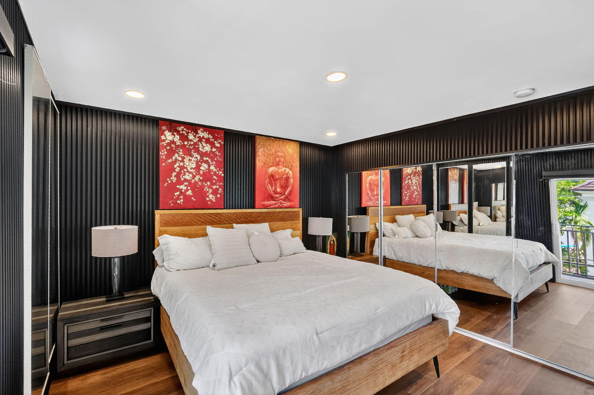 363 Washington Avenue, Unit 32 Miami Beach, FL 33139 - Photo 15 of 32 a bedroom with two beds and a flat screen tv