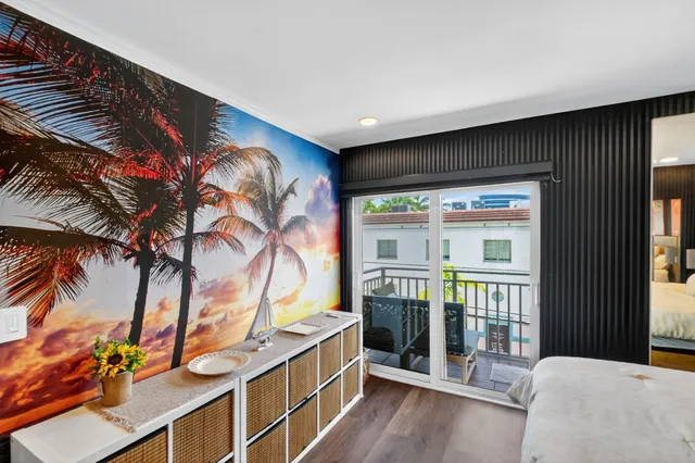 a view of a room with furniture and garden view