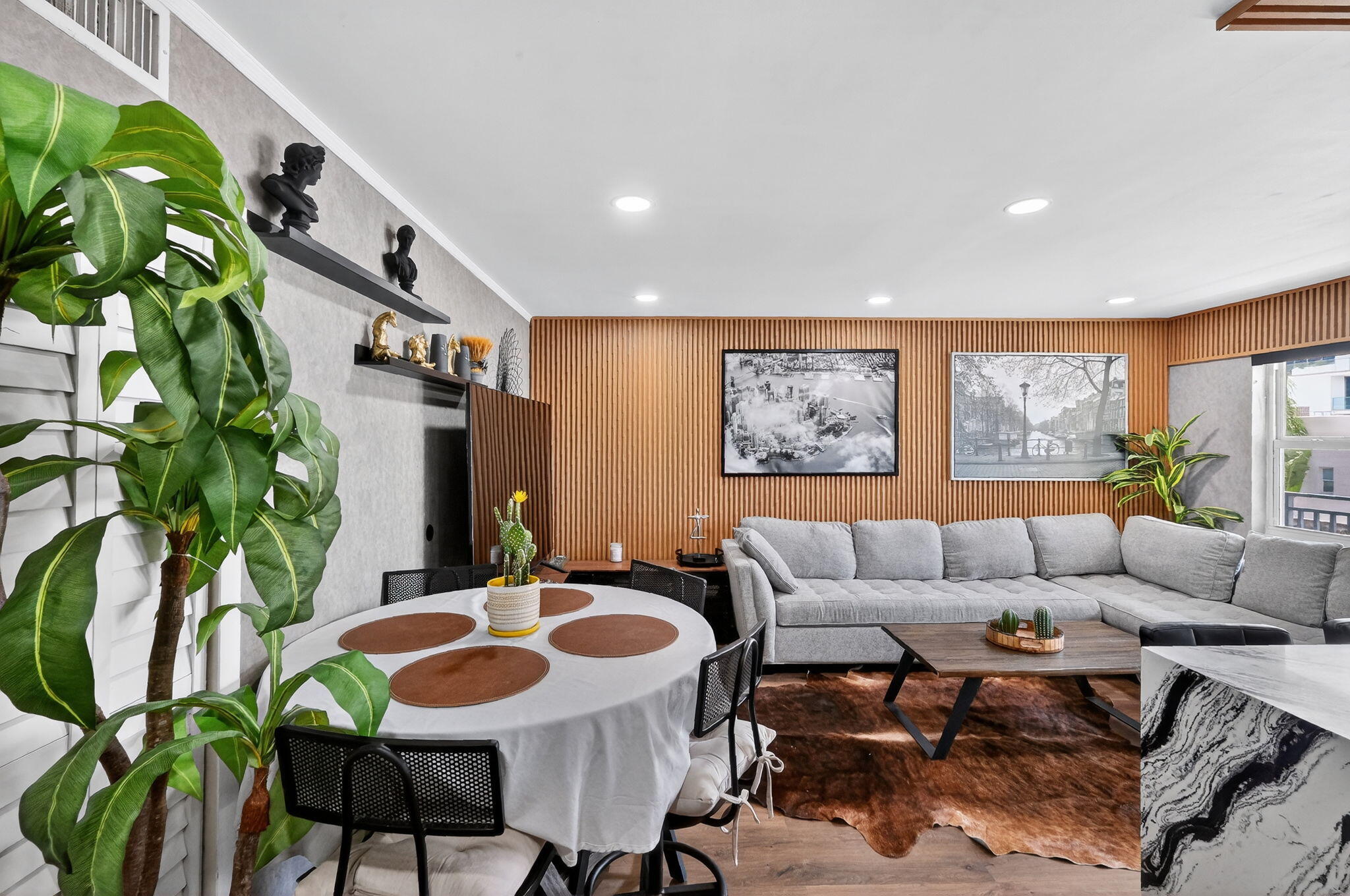 363 Washington Avenue, Unit 32 Miami Beach, FL 33139 - Photo 3 of 32 a living room with furniture and a potted plant
