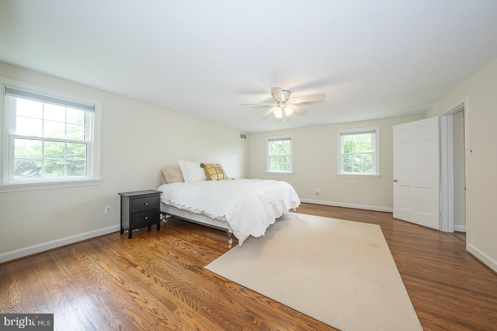 538 Conestoga Road Villanova, PA 19085 - Photo 19 of 39 a bedroom with a bed and wooden floor