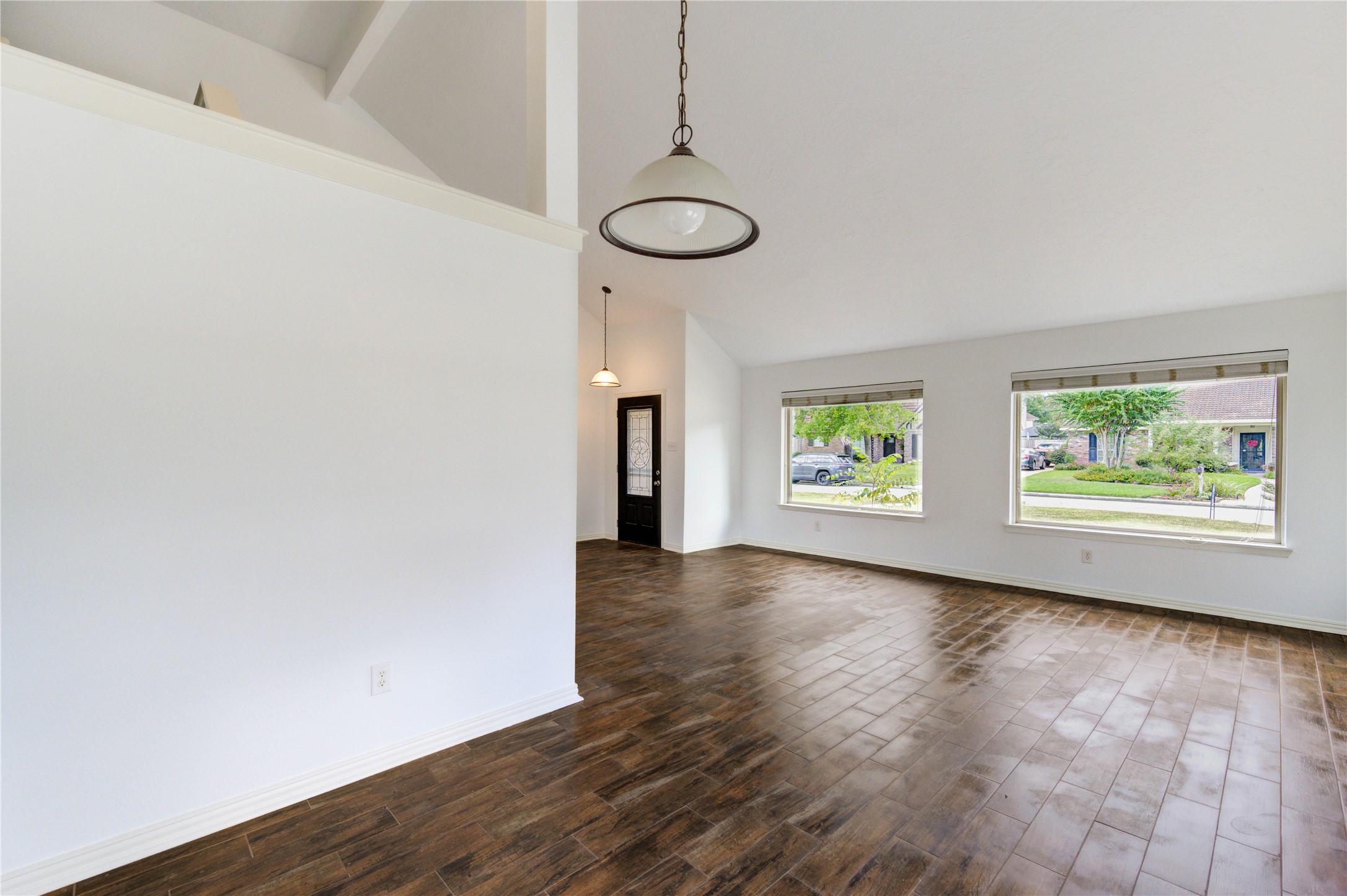 3639 Fir Forest Drive Spring, TX 77388 - Photo 9 of 44 an empty room with wooden floor and windows