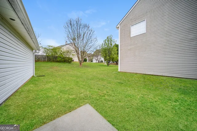 a view of a backyard with a garden