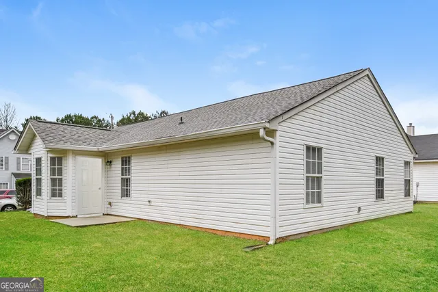 a view of a backyard with a garden