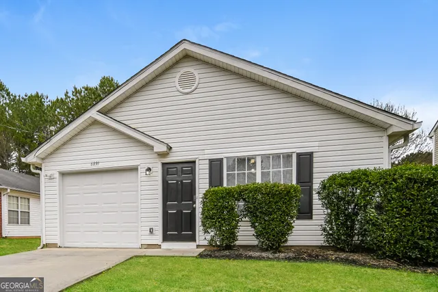 a front view of house with yard