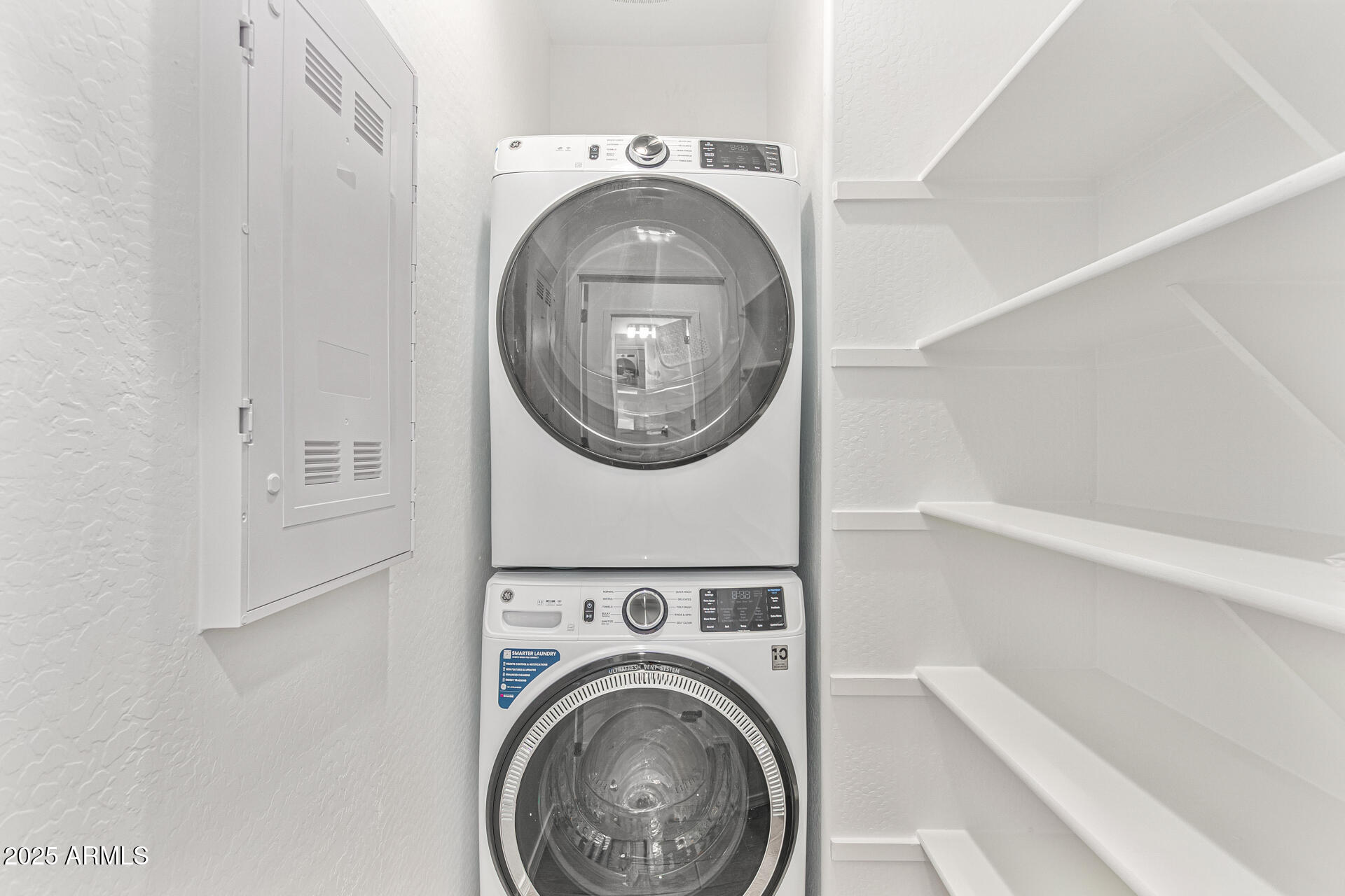 14134 West Hackamore Drive Surprise, AZ 85387 - Photo 13 of 17 Indoor laundry room