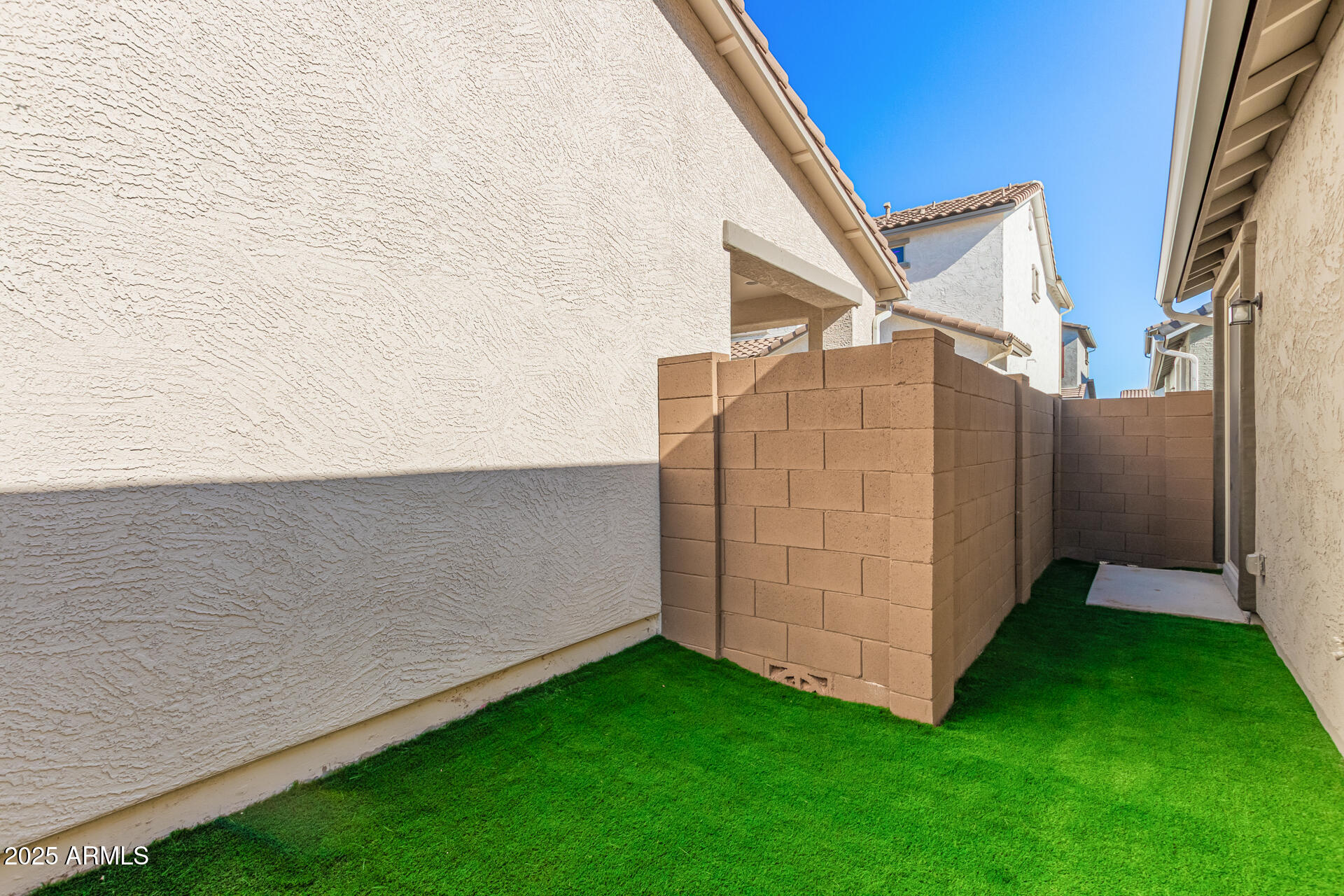 14134 West Hackamore Drive Surprise, AZ 85387 - Photo 16 of 17 Patio with turf