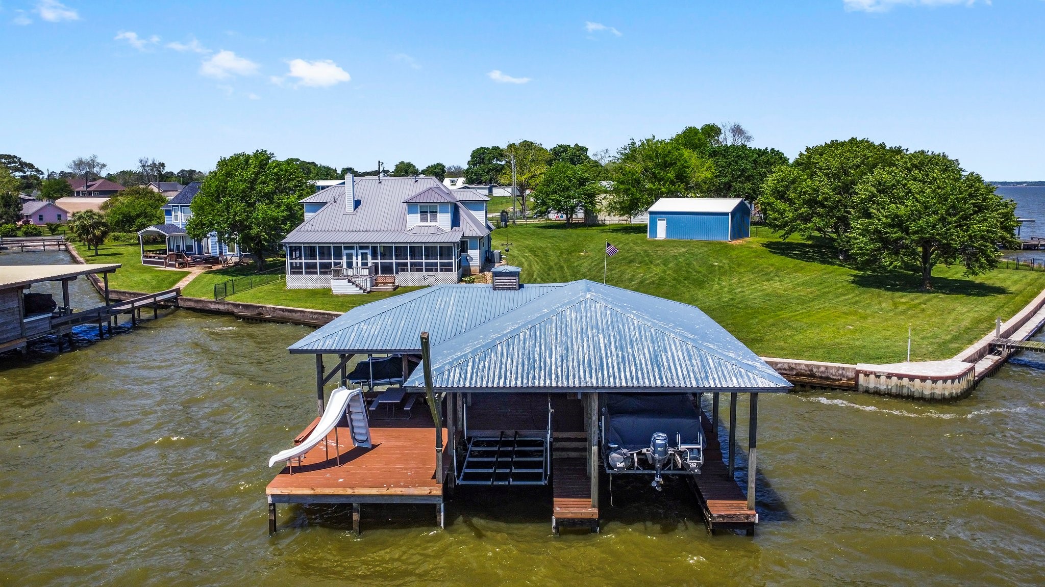 Great view of home and lots from the water. Boathouse has been well maintained and is in terrific shape!