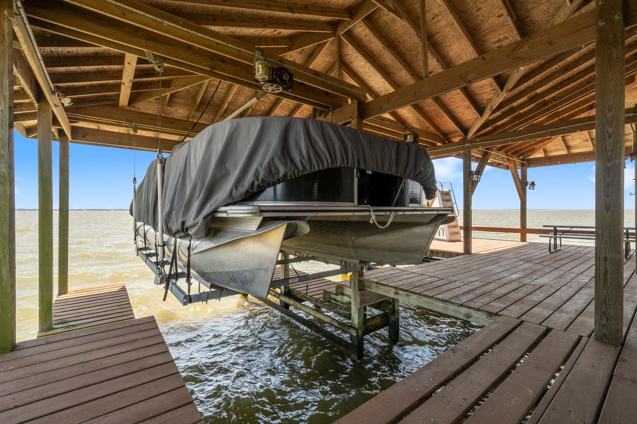 237 Vivian Road Onalaska, TX 77360 - Photo 43 of 49 Covered Boat storage with electric lift